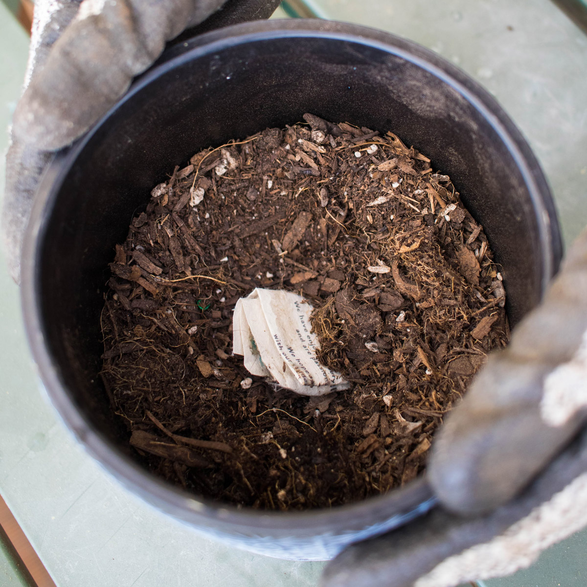 cover paper with soil